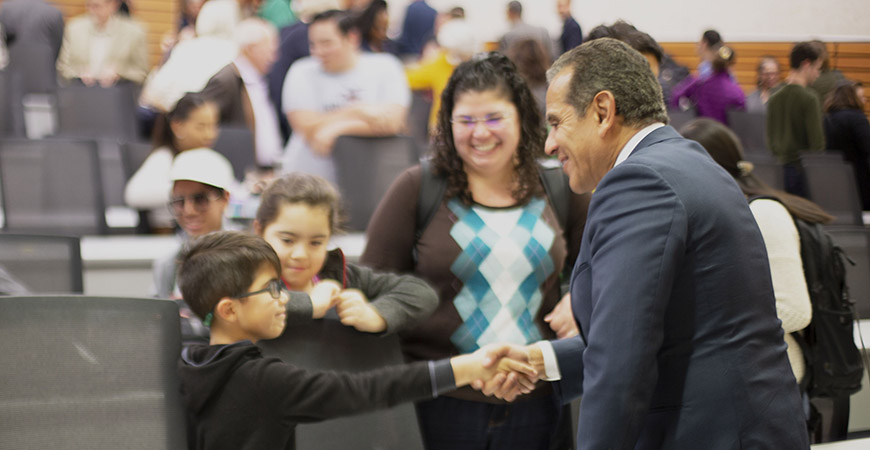 Former L.A. Mayor Antonio Villaraigosa meets with community members following Tuesday’s event.