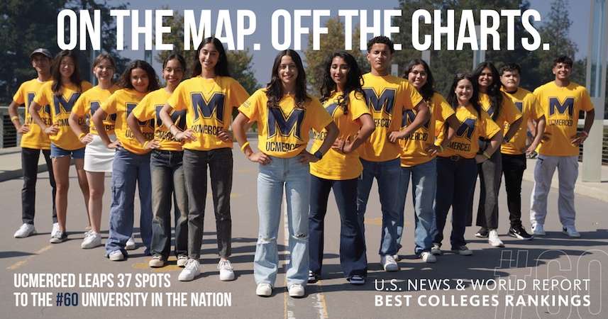 Students are shown on Scholars Bridge at UC Merced